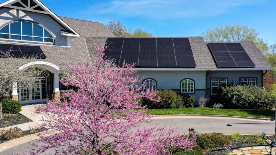 Non-profit building with rooftop solar panels – sustainable solar energy solution for schools and nonprofit organizations